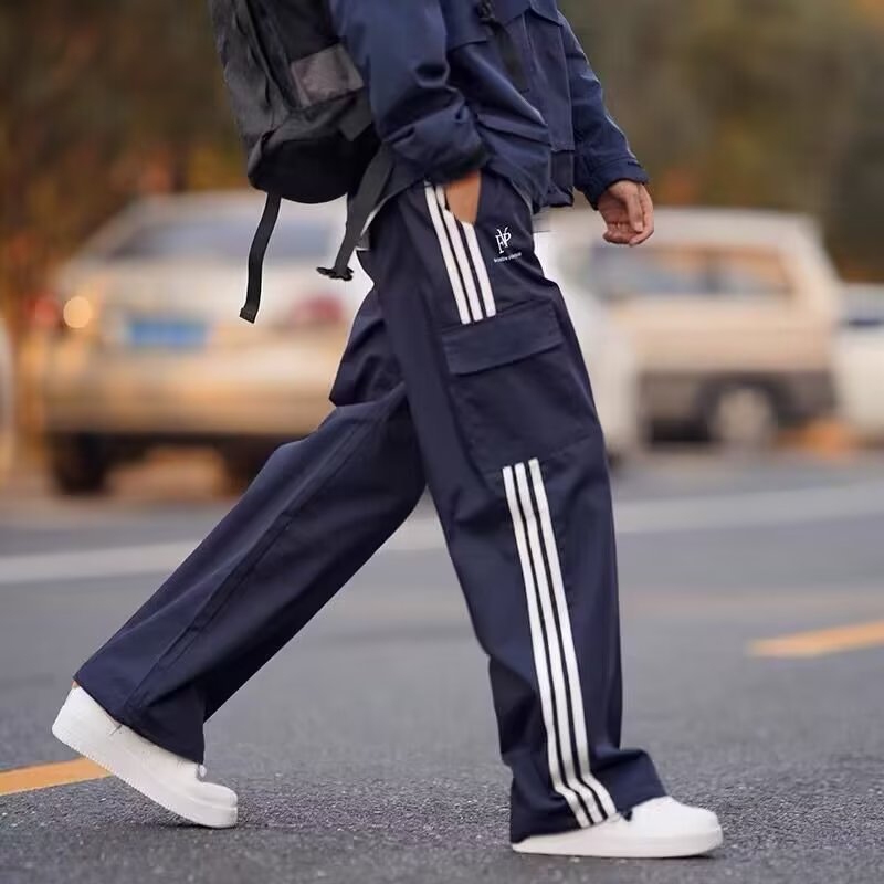 กางเกงชาย  มีแถบข้าง3แถบ กางเกงวอร์มขากว้าง วัยรุ่นสไตล์เกาหลี ไซซ์ M - 3XL กางเกงขายาวทรงตรง  แบบบาง การออก