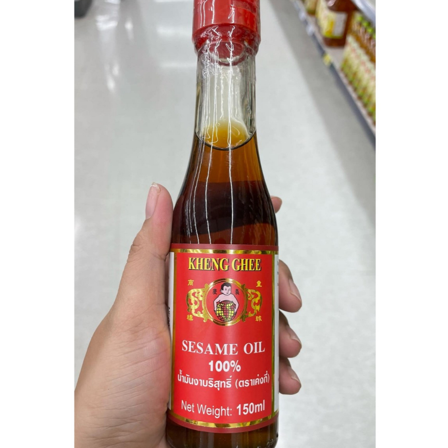 น้ำมันงา น้ำมันงาบริสุทธิ์ น้ำมันงาตราเค่งกี่ จำนวน1ขวด/150ml. KHENG GHEE ใช้ปรุงรสหมักและใช้เป็นน้ำมันสำหรับสูตรผัด