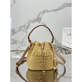 Prada crochet and leather mini bucket bag 2023