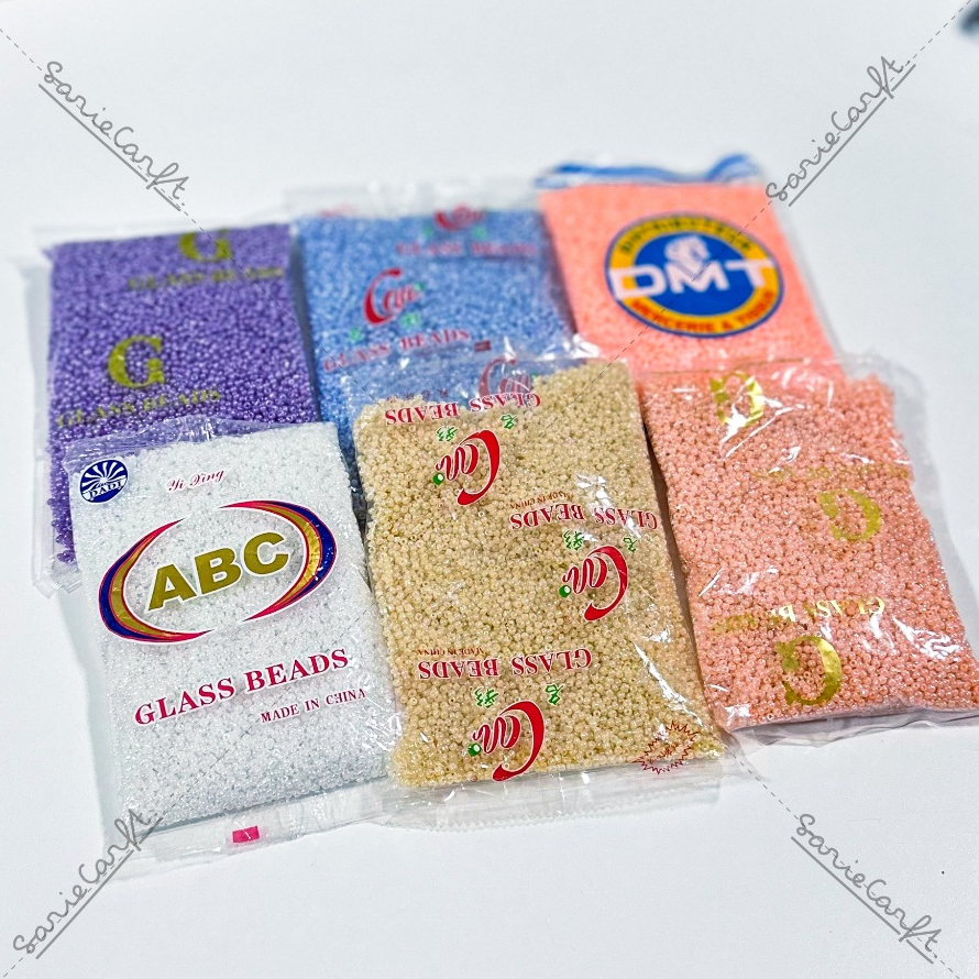 (ถุงใหญ่) ลูกปัดเม็ดทราย ขนาด 3 มม. สีเหลือบแวว 450 กรัม คละแบรนด์