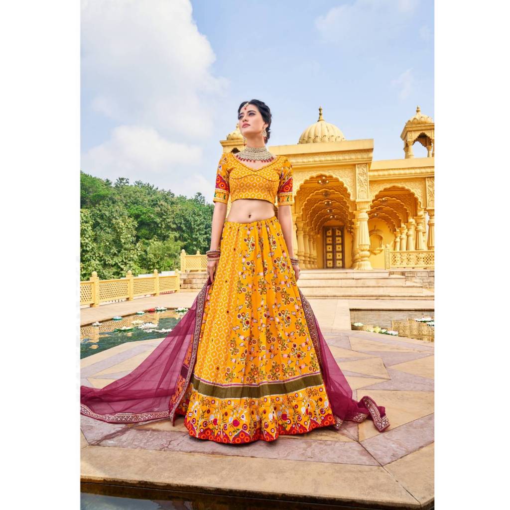 Lehenga Fabric : Vaishali silk  Lehenga work : Printed with gota patti and mirror work Waist : suppo
