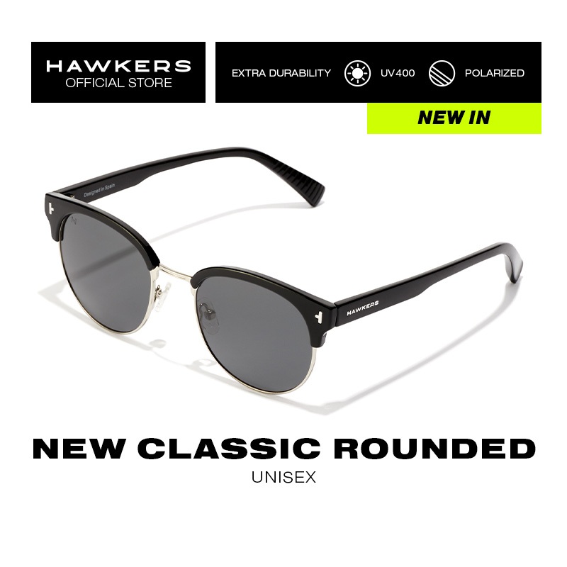 HAWKERS Polarized New Classic Rounded แว่นกันแดดสำหรับทั้งชายและหญิง ยูนิเซ็กซ์ ผลิตภัณฑ์อย่างเป็นทางการได้รับการออกแบบในสเปน.
