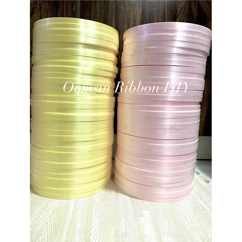 ริบบิ้นตราดอกไม้ สีพลาสเทล เบอร์ 2 ยาว 300 หลา เนื้อทราย