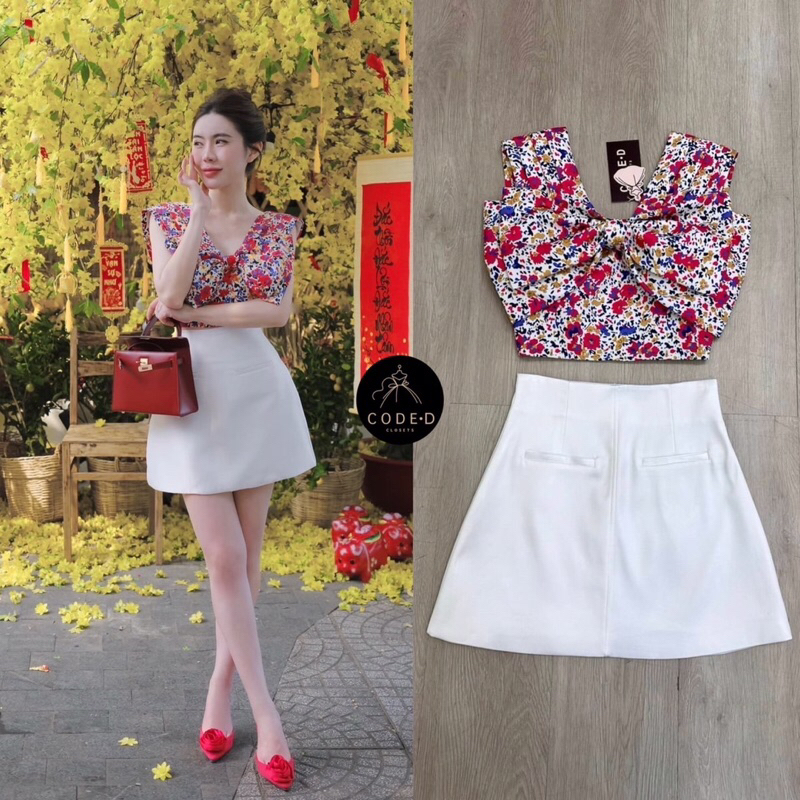 CODE-D CLOSETS  ชุดเซต2ชิ้น เสื้อครอปแขนกุดพิมพ์ลายดอกสีสันi