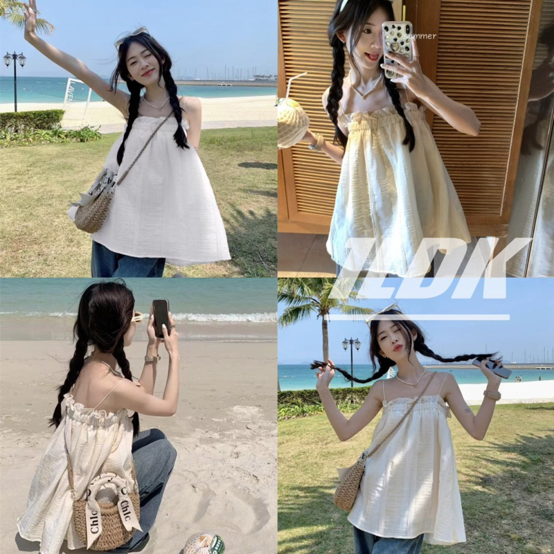 1LDK พร้อมส่ง เสื้อสายเดี่ยว สม็อคอก ใส่ได้2แบบ เนื้อผ้าไม่บาง มีซับใน ใส่ไปทะเลน่ารักคิ้วท์ๆ(60162)