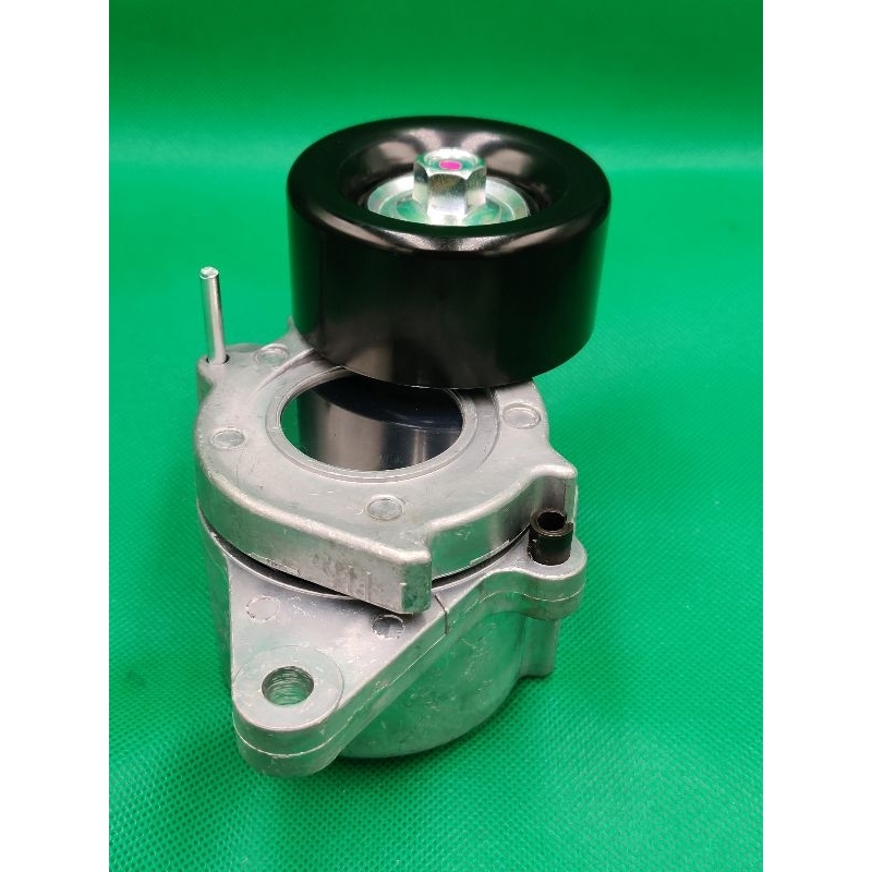 ลูกลอกดันสายพานหน้าเครื่องTENSIONER ASSY  NP300  Nissan Navara (Engine-YD25DDTI )  (11955-5X00E) แท้