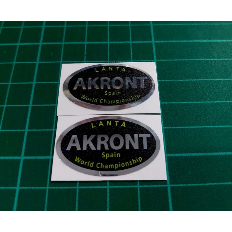 sticker AkRON   โคเมื่ยมผิวด้านคู่