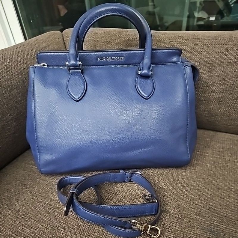 กระเป๋าหนัง Louis Quatorze