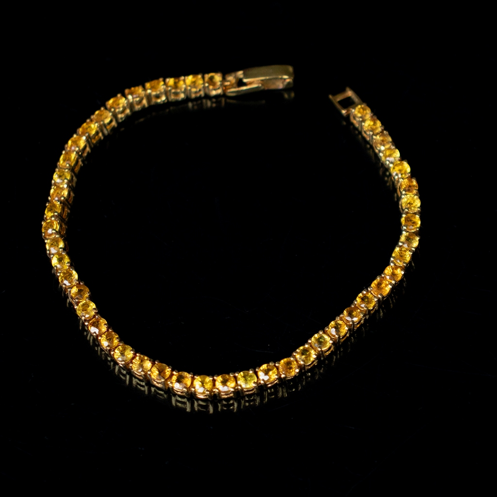 สร้อยข้อมือพลอยบุษราคัมสีน้ำทองบางกะจะ(Yellow Sapphire) ตัวเรือนเงินแท้ 92.5 % ชุบทอง ความยาวสร้อข้อมือ 19 ซม. พลอยแท้ ข