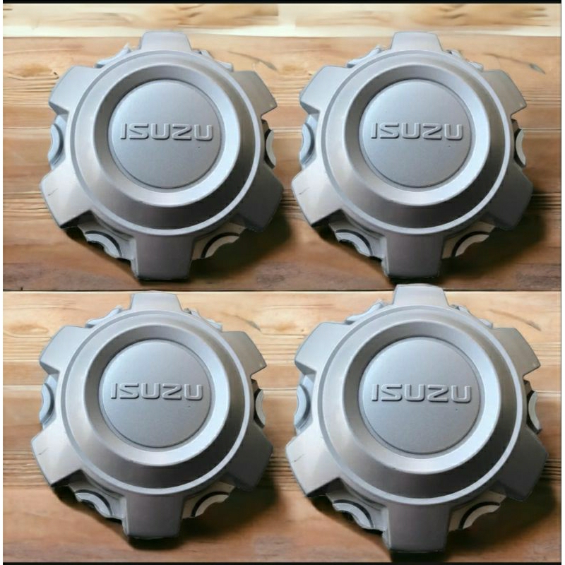 ฝาดุ้มล้อแท้ เบ้าล้อ ฝาปิดกลางเบ้า ฝาล้อ ที่ปิดล้อ ฝาครอบดุ้มล้อ อีซูซุ เก็บสีใหม่ขายราคาถูก(ราคา4ชิ้น)มีพร้อมจัดส่ง