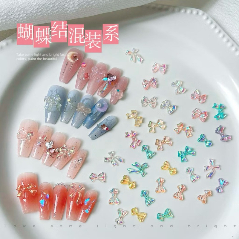 AC.768 ร้านไทย แพ็ค 10 ชิ้น พร้อมส่ง เรซินสำหรับแต่งเล็บรูปโบว์และหมี สีใสออโรร่าคละสี