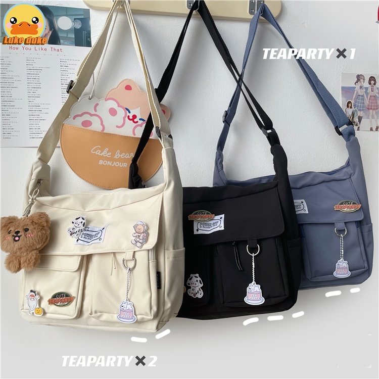 พร้อมส่ง กระเป๋าสะพายไหล่ ผ้าแคนวาส กระเป๋าสะพายข้าง วินเทจ แฟชั่น ปรับสายได้ ช่องเก็บของเยอะ