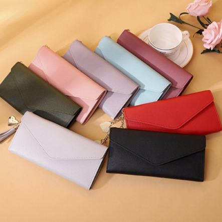กระเป๋าสตางค์ใบยาว สีพื้น ห้อยพู่ แบบ3พับ อะไหล่สีทอง รูปหัวใจน่ารักๆ [ส่งฟรี* ไม่ต้องใช้โค้ด]