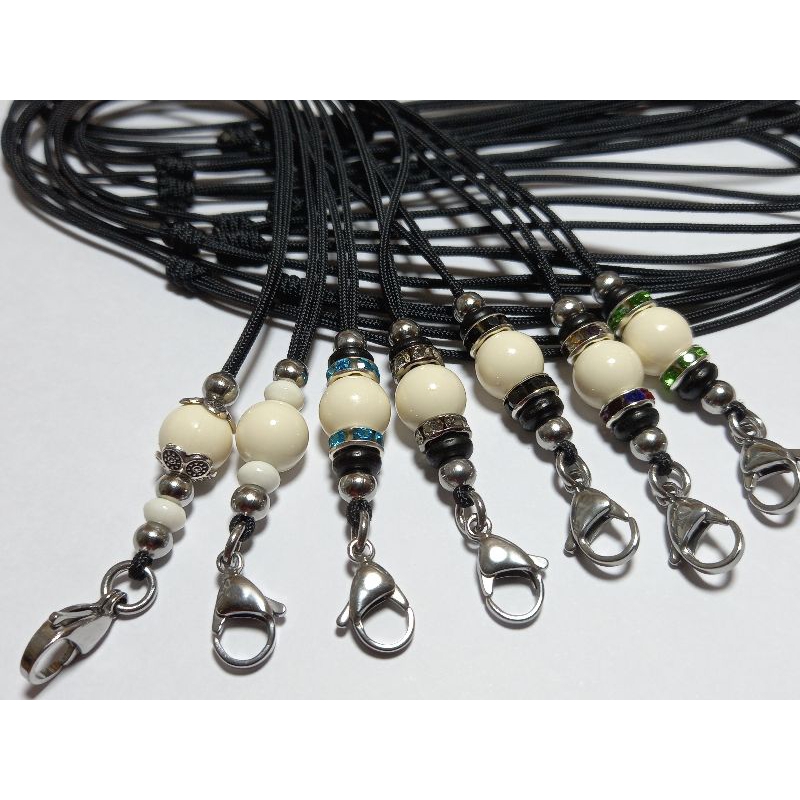 สร้อยพระเชือกร่มขนาด 1.2 มิลลิเมตรคั่นเม็ดประคำสีงาช้าง แต่งเม็ดสแตนเลสก้ามปูสแตนเลส งานแฟชั่นสวยๆราคาถูก