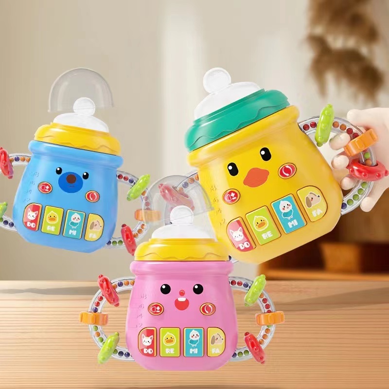 (พร้อมส่ง)จุกนมหลอกเด็กทารกแรกเกิด ยางกัดนุ่ม เขย่าแล้วมีเสียง ของเล่นเด็ก ขวดนม มีเสียงเพลง มีไฟ ไม่เป็นอันตรายต่อเด็ก