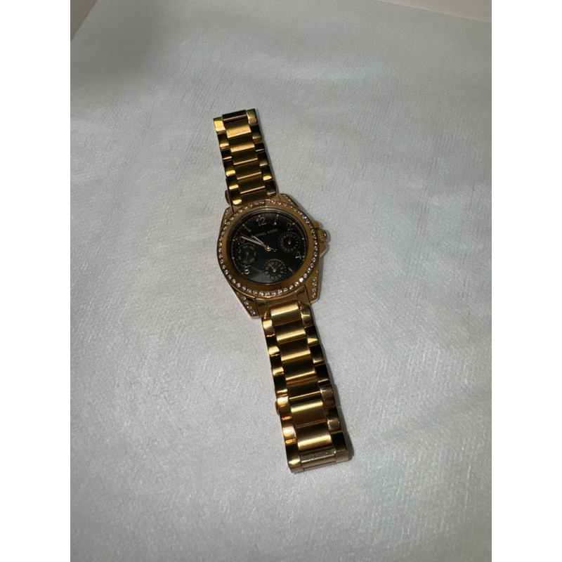 นาฬิกา Michael Kors สีทองล้อมเพชร สเตนเลส หน้าปัดสีดำ รุ่น boy size
