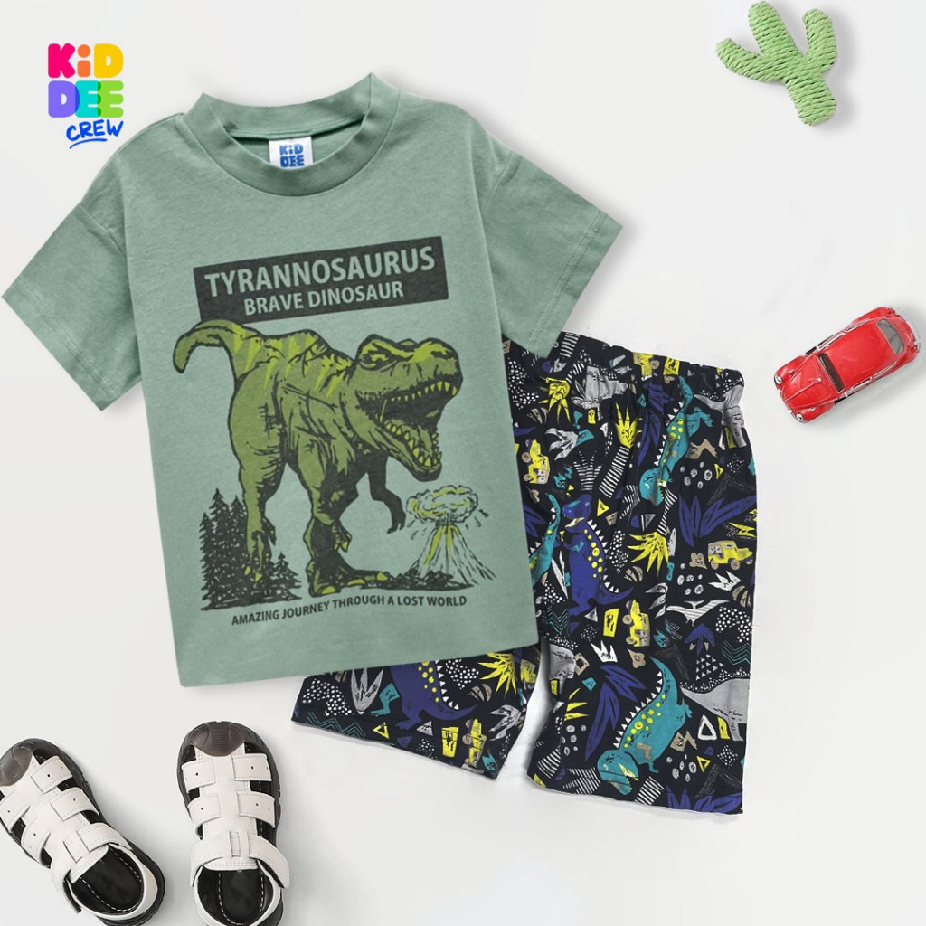 KiddeeCrew ชุดเซ็ท เสื้อเด็กและกางเกงเด็ก ลายไดโนเสาร์สีเขียว แขนสั้นขาสั้น เหมาะสำหรับอายุ 1-12 ปี