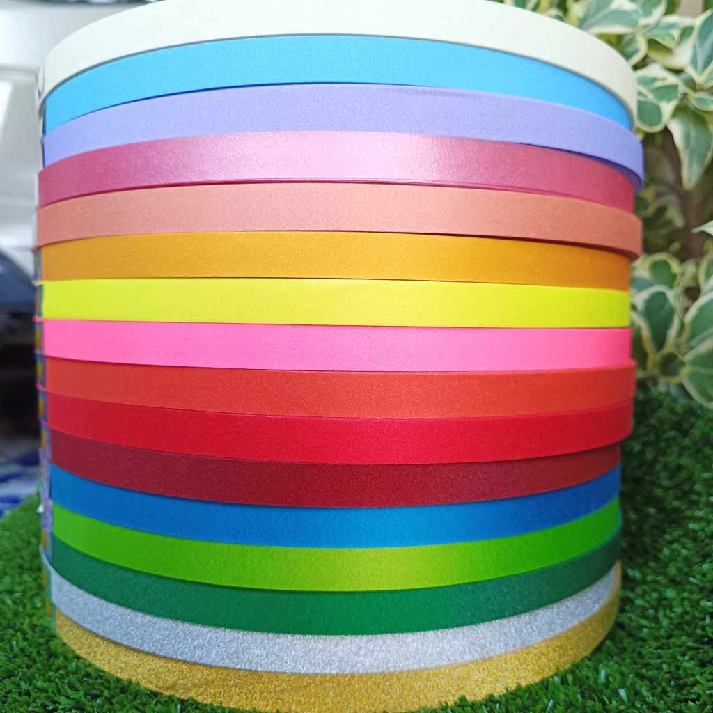 ริบบิ้นกากเพชรทึบละเอียดตรามงกุฎ ม้วนใหญ่ ยาว 270 หลา ขนาด 12 mm. พับเหรียญโปรยทาน (ราคาต่อม้วน)