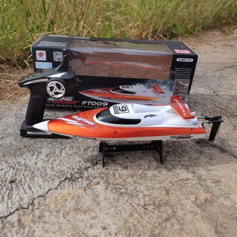 เรือเร็วบังคับวิทยุ FT009 RC SPEED30KMH 2.4GHZ RACING BOAT สินค้าชุดพร้อมเล่น
