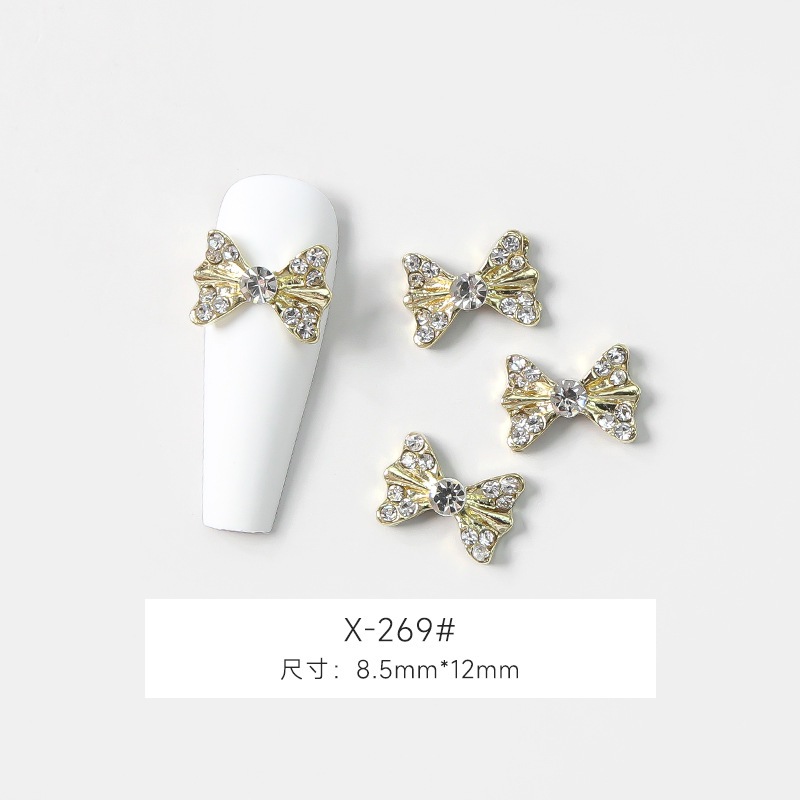 อะไหล่ตกแต่งเล็บ โบว์ โบว์ติดเล็บ โบว์เพชร สีเงิน สีทอง รหัส X-269/ X-270  ราคาต่อ1ชิ้น - รูปที่ 3