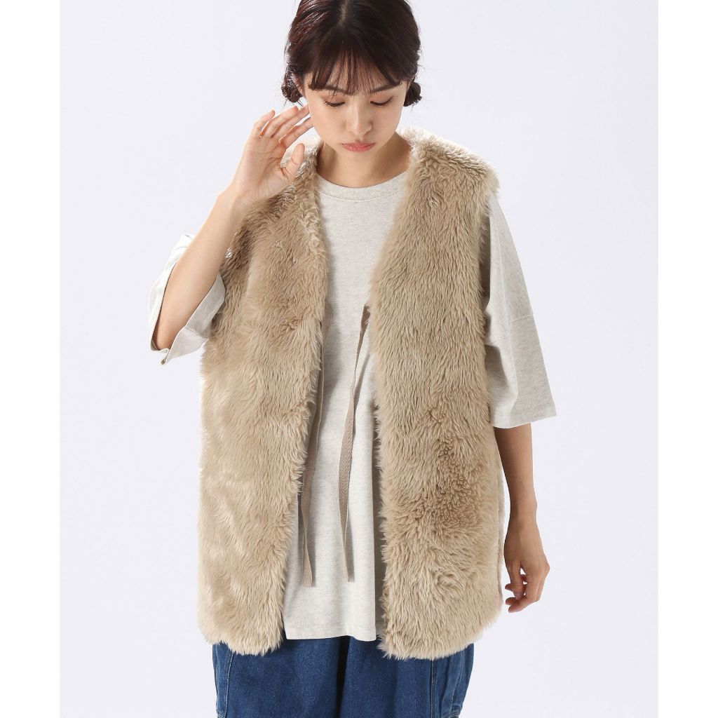 niko and... Reversible fur vest