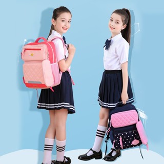 กระเป๋านักเรียนเด็กและเด็กผู้หญิง 2025 ป้องกันกระดูกสันหลังน…