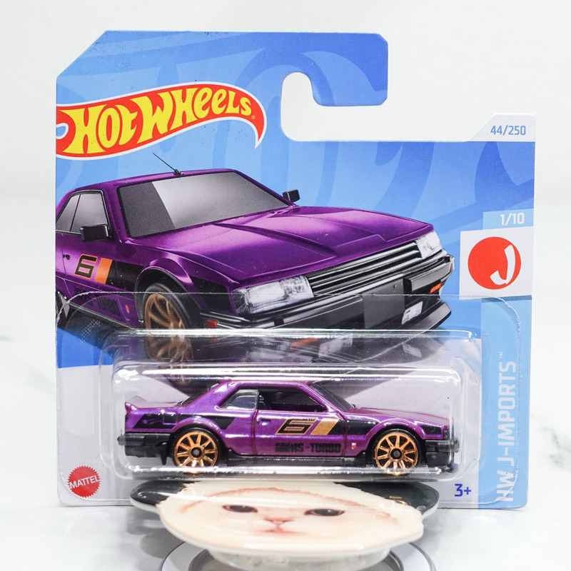 โมเดลรถเหล็ก Hotwheel แพ็คสั้น Nissan Skyline RS (KDR30) สีม่วง