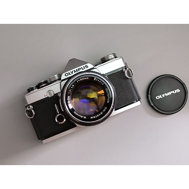 Olympus OM-1พร้อมเลนส์ Olympus OM 50mm f1.4