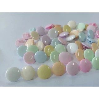 กระดุมขาสอย15มิล​ สีพลาส​เทล​ใหม่หวานสวย10สี ห่อละ 12 เม็ด