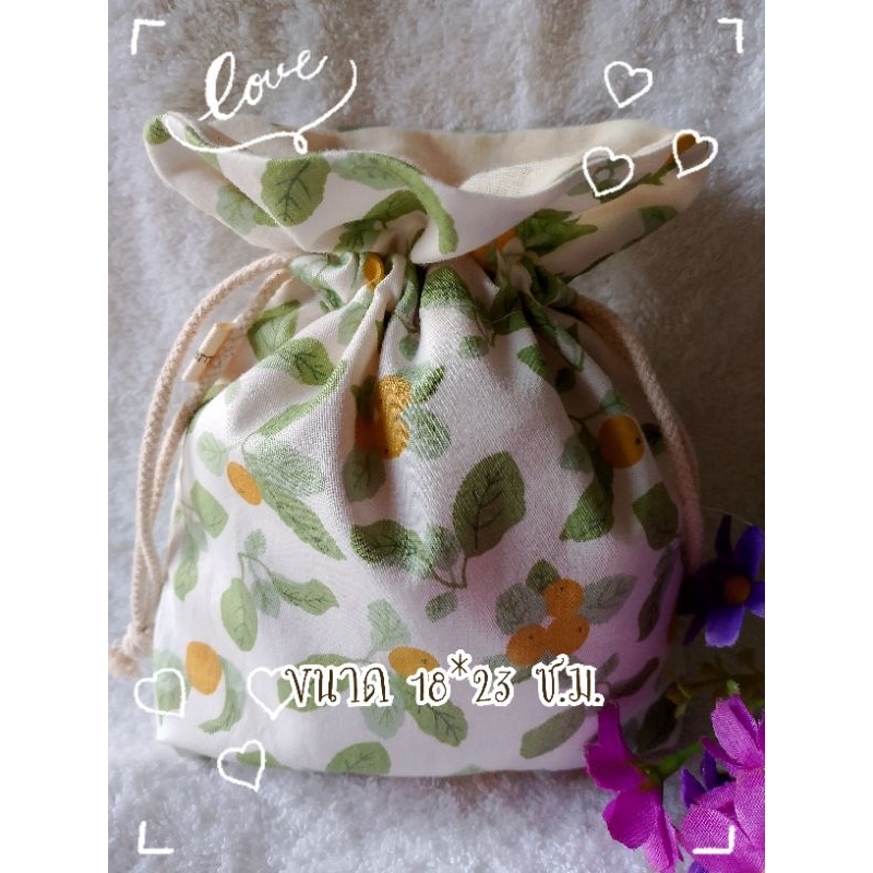 พร้อมส่ง!!!กระเป๋าผ้าหูรูดลายใบไม้พื้นขาว ใส่โทรศัพท์ได้
