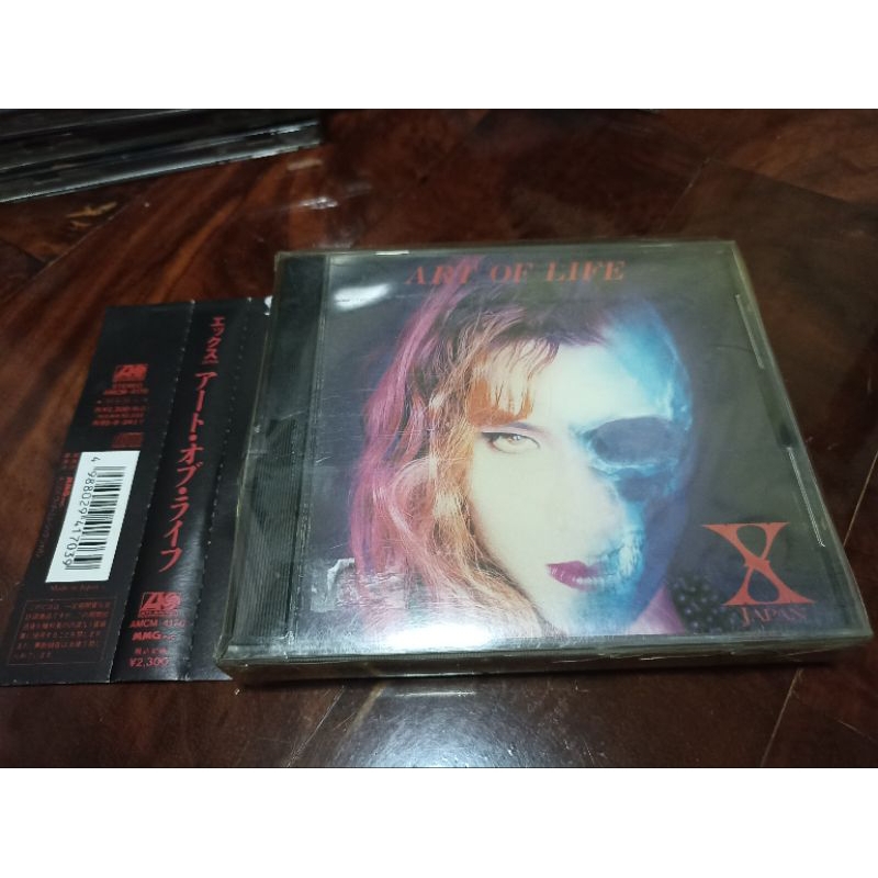 ซีดีเพลง cd music X-Japan Art of Life แผ่นญี่ปุ่นมือสอง มี Book แผ่นสวย กล่องพลาสติกสวมแตกร้าว