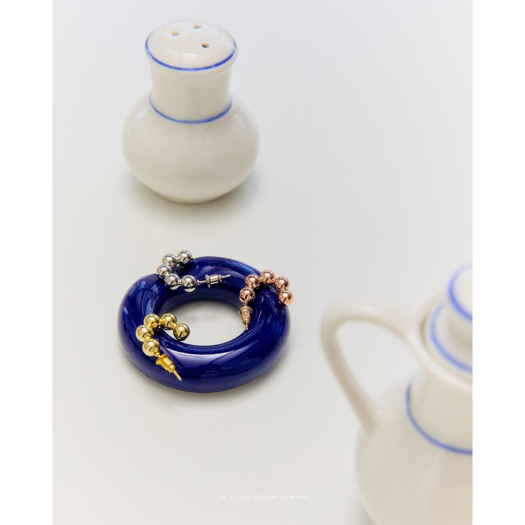 Julys - caterpillar stud earrings
