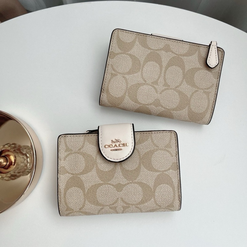 กระเป๋าSignature coated canvas and smooth leather 6390