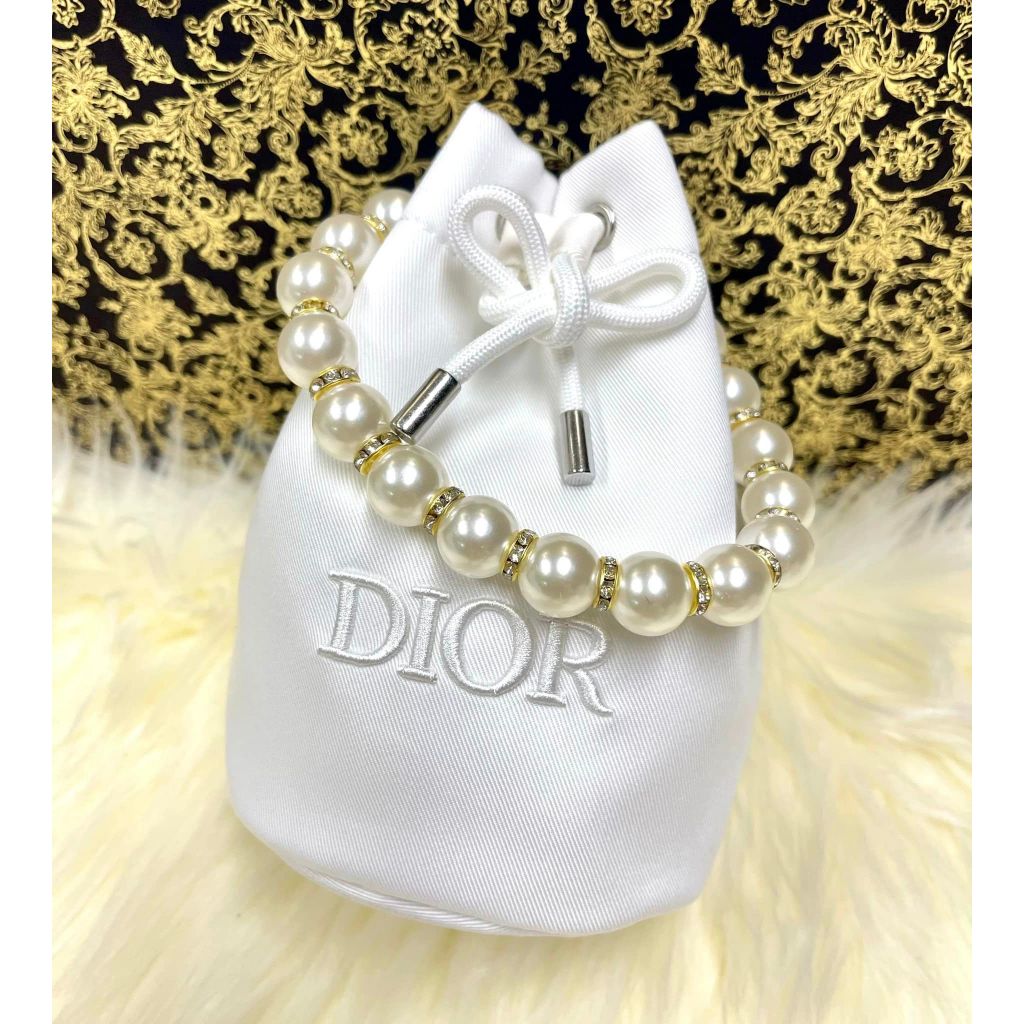 กระเป๋า Dior bucket bag ทรงขนมจีบ สีครีม