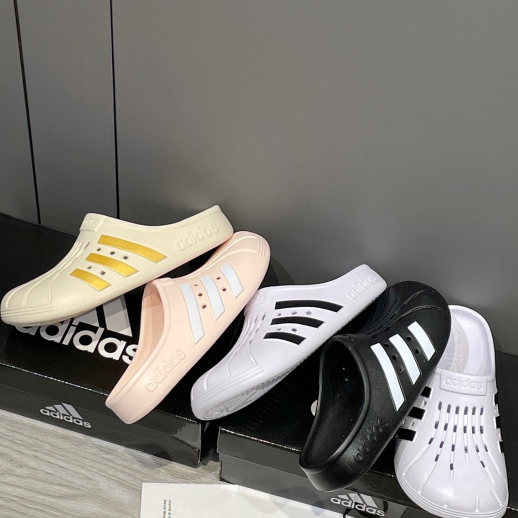 Adidas ADILETTE CLOG cavernous รองเท้าแตะลําลอง ระบายอากาศ เหมาะกับเดินชายหาด สําหรับผู้ชาย ผู้หญิง