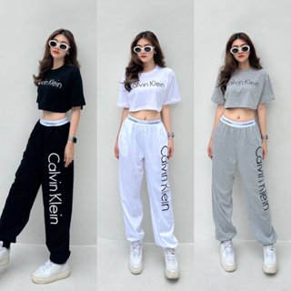 New Collection !!!! Calvin Klein Crop Set  เซทเสื้อครอปคอกลมแขนสั้น สกรีน calvin klein กลางอก มาพร้อมกางเกงขายาวจั้มปลาย