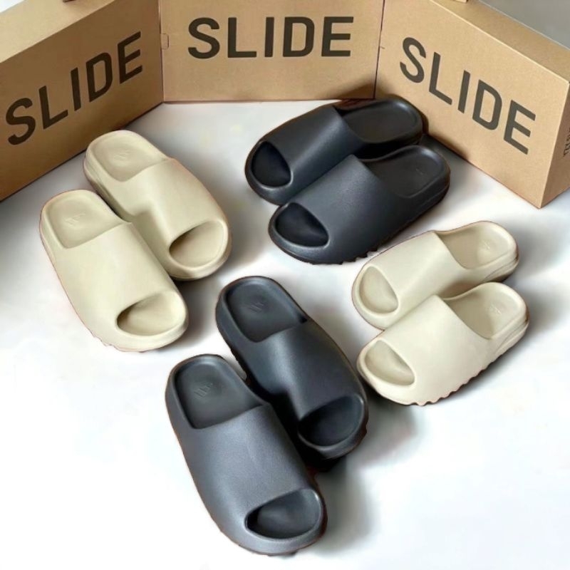 📌สีหายาก รองเท้าแตะ yeezy slide 📌มีกล่อง📦 ผิวหยาบ พื้นโลโก้ ด้านในปั้ม มีป้ายQR CODE รองเท้าแตะไซส์ใหญ่ นุ่มสบาย⭐️