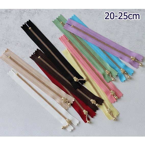 ซิปฟันเหล็กสีทอง เบอร์ 3 แบบตุ้มเหล็ก YKK ขนาด 20-25 ซม. (เลือกสีด้านในค่ะ)