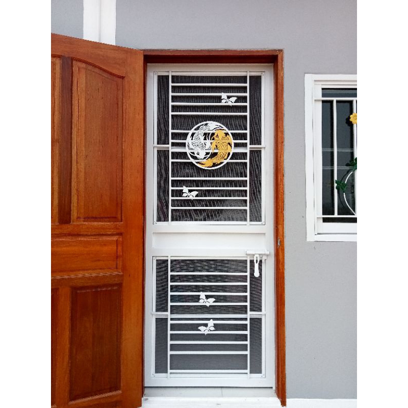 ประตูเหล็กดัดลายปลาค๊าฟ🐠 .💥พร้อมมุ้งลวด📌ขนาดรวมวงกบ สั่งทำรายละเอียดทักแชท