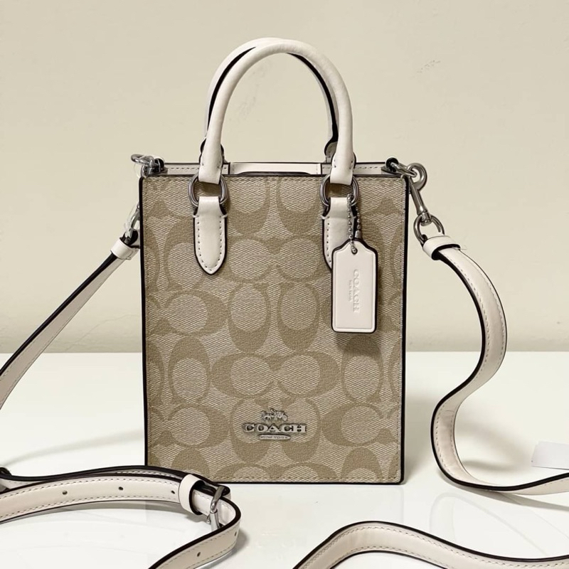^-^ส่วนลดXtra แฟชั่น 30%+ส่วนลดร้านค้า 5%: พร้อมส่งที่ไทย C0ACH NORTH SOUTH MINI TOTE IN SIGNATURE CANVAS No.CJ494