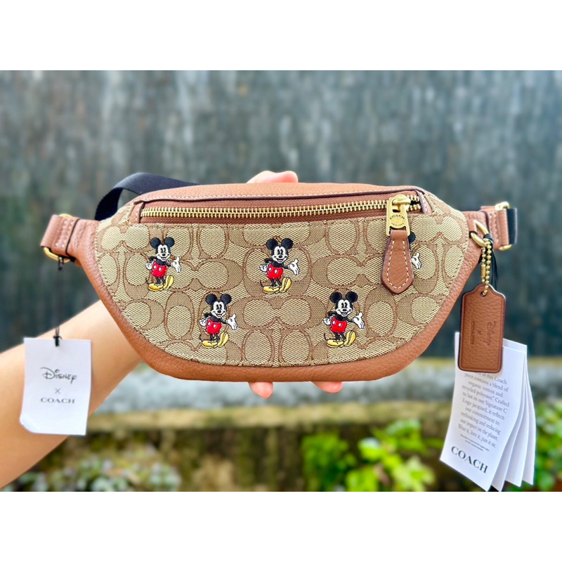 กระเป๋า Coach แท้💯"Disney X Coach Warren Mini Belt Bag In Signature Jacquard With Mickey Mouse Print" สินค้าพร้อมส่ง