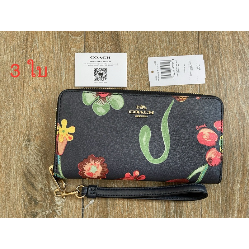 (ผ่อน0%) กระเป๋าสตางค์ใบยาว COACH LONG ZIP AROUND WALLET WITH DREAMY LAND FLORAL PRINT C8694 ใบยาว ซิปรอบ สีดำ ลายดอกไม้