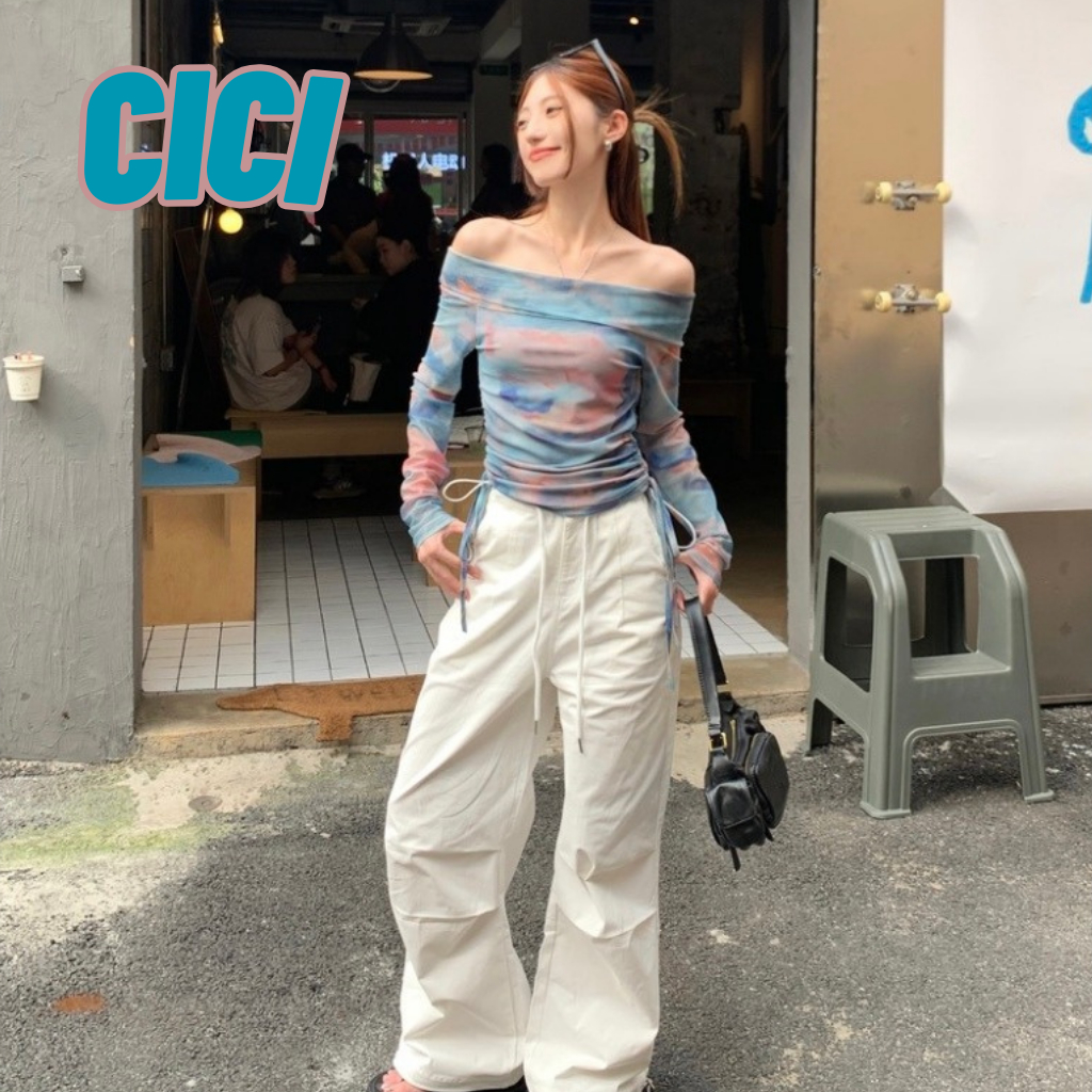 ส่งทันที Cici(NO. J1000)เสื้อแขนยาวปาดไหล่ผ้าซีทรู ดีเทลรูดข้าง สีสันสดใส