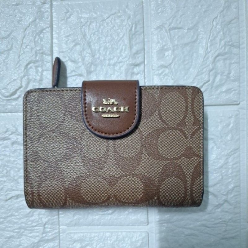 กระเป๋าสตางค์ Coach สีน้ำตาล