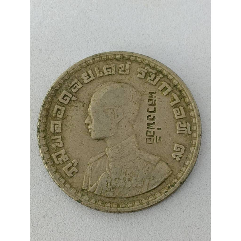 เหรียญหนึ่งบาท ปี2505 ตอกโค้ดหลวงพ่ออี๋ วัดสัตหีบ หลวงปูทิมปลุกเสกปี 2515