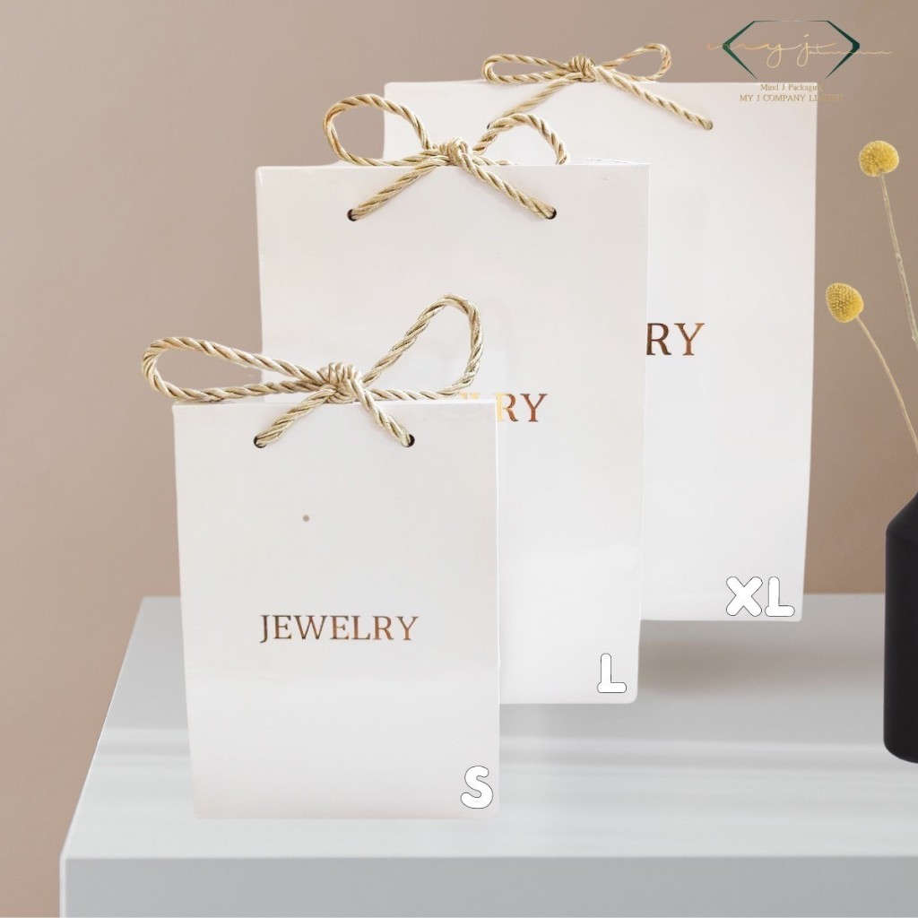 ถุงกระดาษสีขาวพร้อมพิมพ์ลาย Jewelry สีทอง ถุงใส่เครื่องประดับ ถุงใส่สินค้าสุดพรีเมี่ยม ถุงของขวัญ