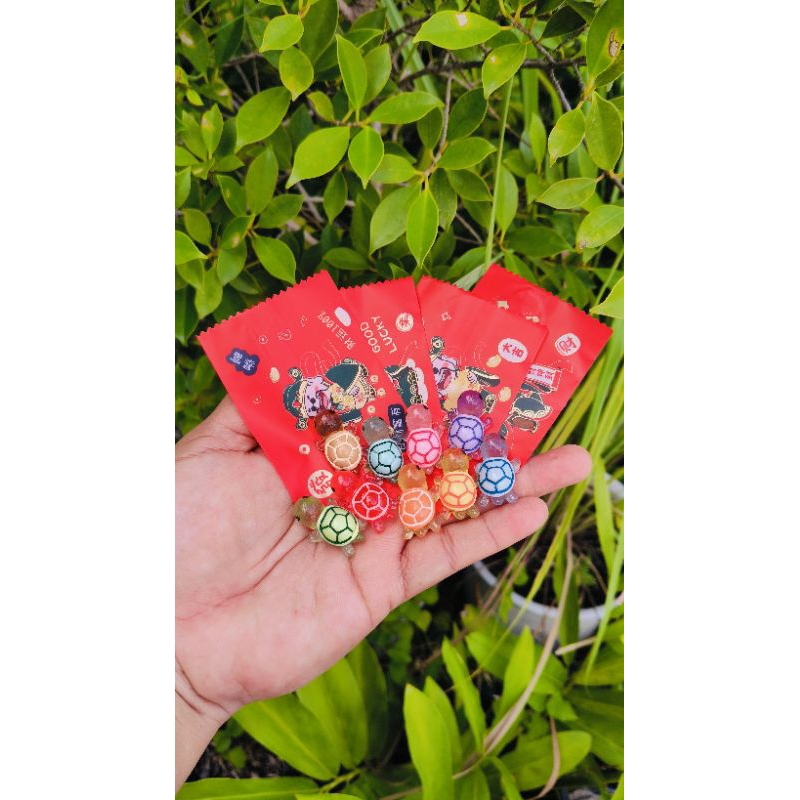ถุงสุ่มเต่า เรืองแสง 2.6เซน(10 ซอง)ถุงสีแดง สุ่มสี มี 9สี