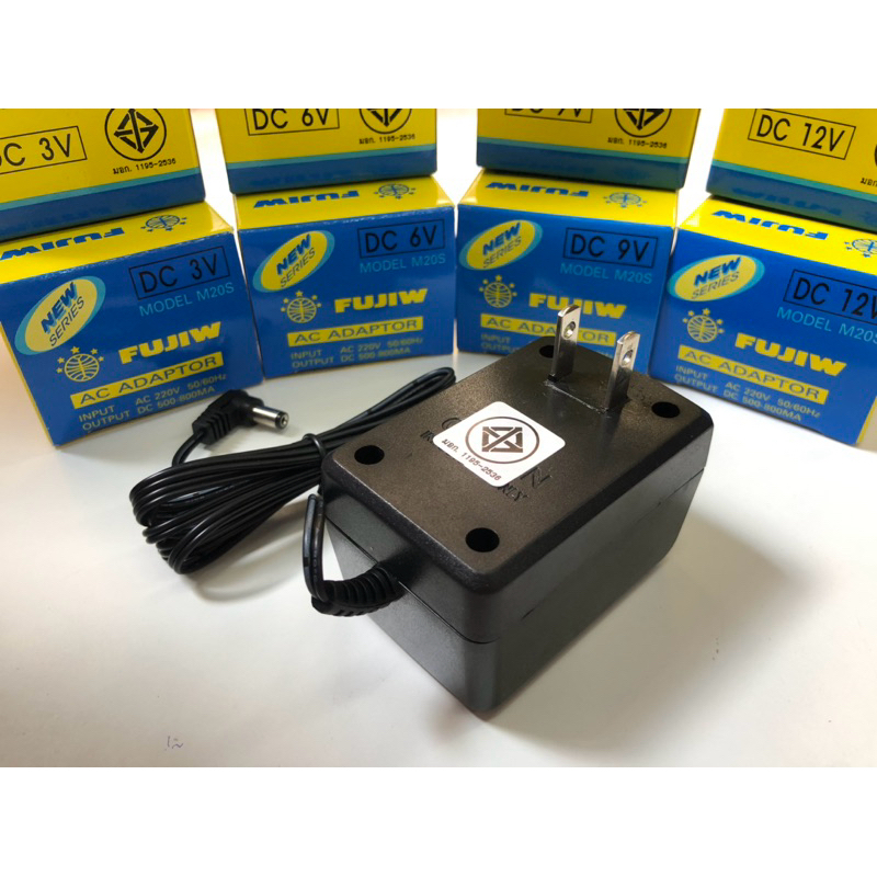 FUJIW อะแดปเตอร์ 9V. 500-800MA กล่องเหลือง +ใน -นอก แจ๊คขอบนอก5.5mm รูใน2.1mm