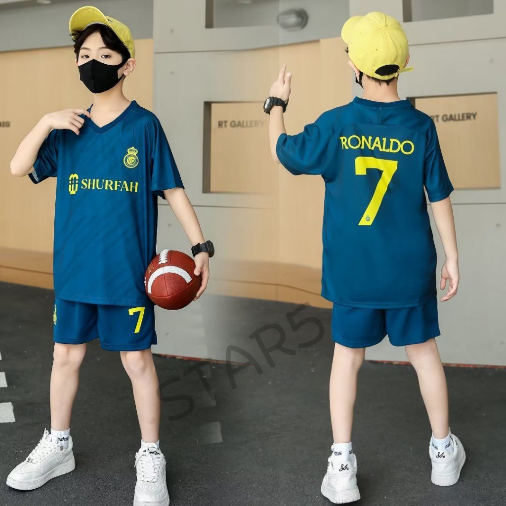 STAR5ชุดกีฬาเด็ก ชุดบอลเด็กทีมอัลนาสเซอร์ พร้อมสกรีนเบอร์ 7 ปี2022 สุดฮิตเสื้อ+กางเกงทีมเยือนสีน้ำเงิน ราคาสุดพิเศษ