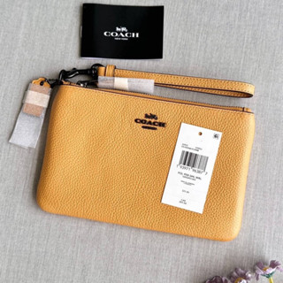 กระเป๋าคล้องมือ งานชอป 1ซิป M Coach Small Wristlet  22952 หนังแท้ สีเหลือง อะไหล่รมดำ 7 นิ้ว